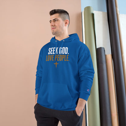 Man wearing the Seek God. Love People. Champion Hoodie in Royal Blue